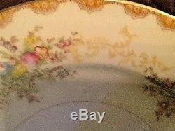 Set of 12 dinner plates by Meito China, hand painted